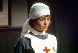 Lesley-Anne Down as Georgina, Aristo cum Red Cross Nurse